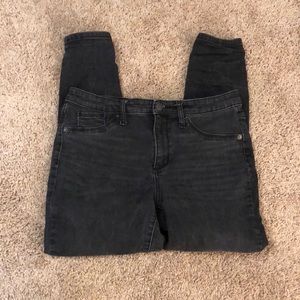 Black pair of universal thread jeans